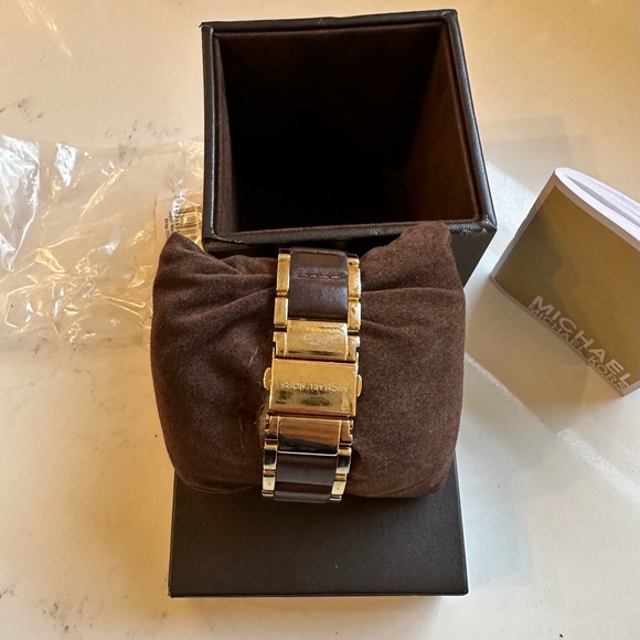 Michael kors watch. Gold and chocolate brown.